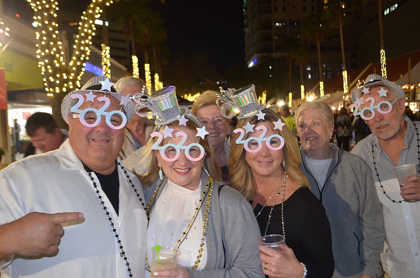 John and Debbie Nielsen, left, Joyce Gaffney, and Pam and Wayne Jones celebrated with 2020 vision.