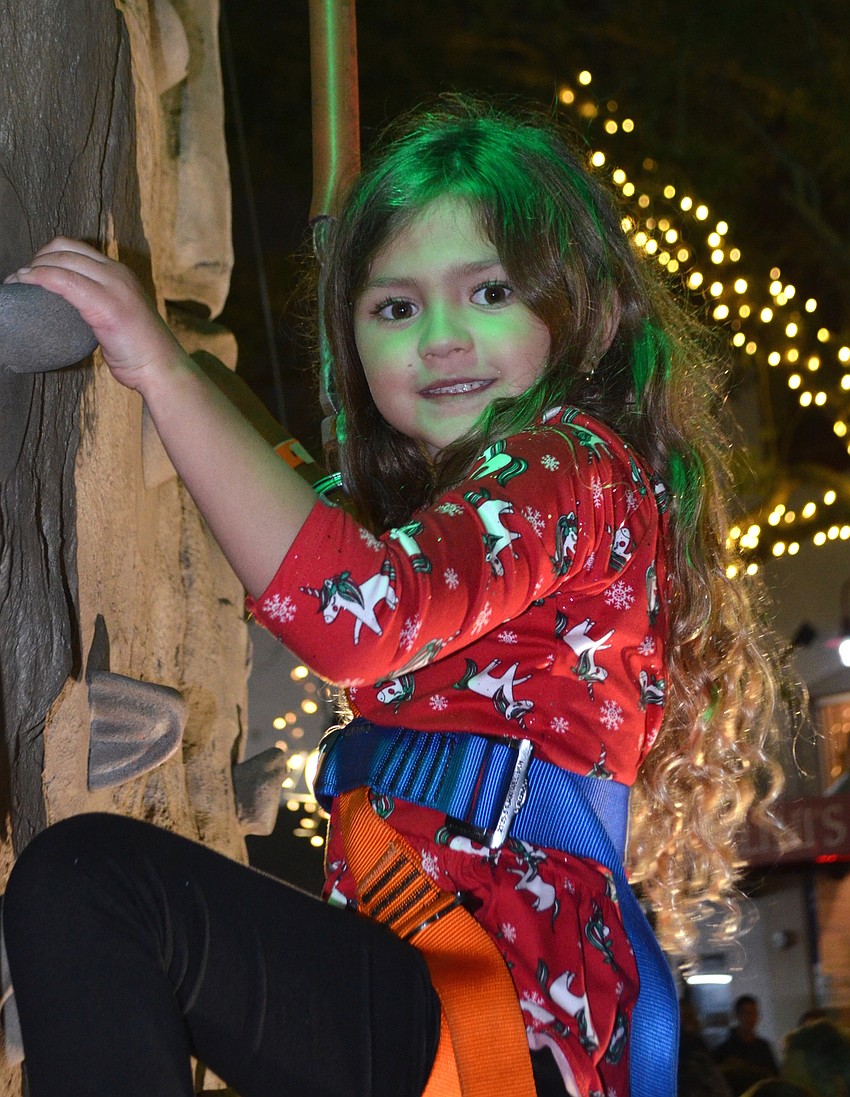 Anastasia Nersesov, from Chicago, challenged the rock-climbing wall with a smile on her face.
