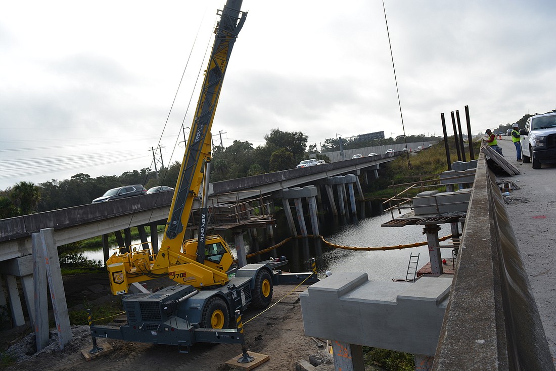 FDOT contractors work on construction a bridge along Interstate 75. File photo.