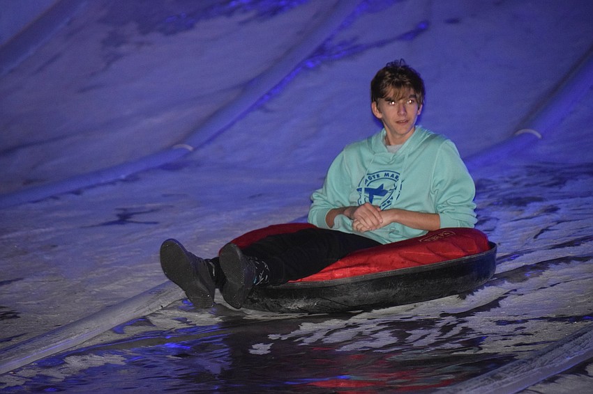 Koy Jacobsen, 14, says sledding is fun, entertaining and exhilarating because it's an activity people don't normally get to do in Florida.
