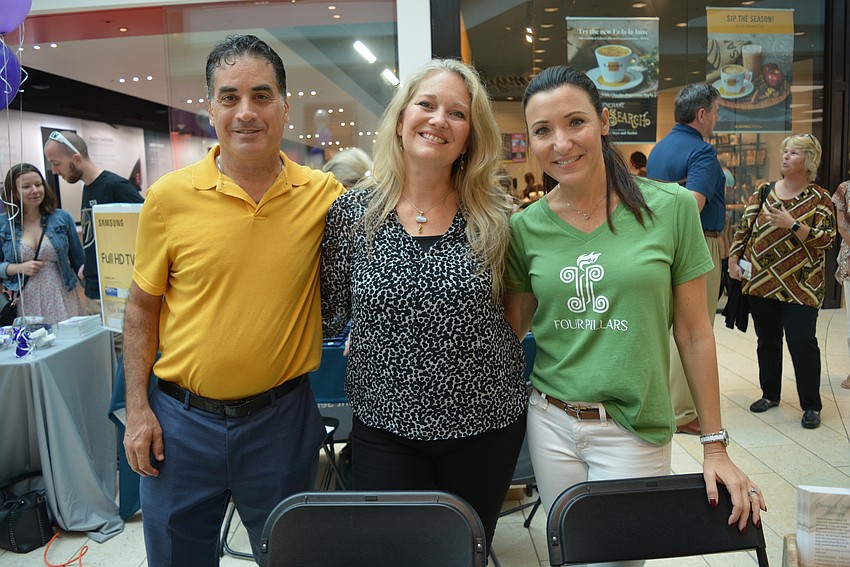 Four Pillars acupuncturist Josh Zimmerman, founder Cheri Christiansen and hypnotist Shana Rosenthal were eager to answer questions about how their services could benefit various health concerns.