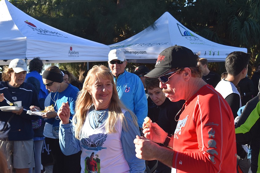Stacey Monroe and Terrance Deshaies dance at the afterparty.