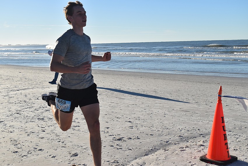 Joey St. Onge kicks to the finish.