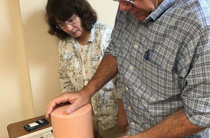 Two attendees learn a technique to control bleeding at a Stop the Bleed training session held by the Longboat Key Fire Rescue Department. (Photo courtesy of Longboat Key Fire Rescue Department)