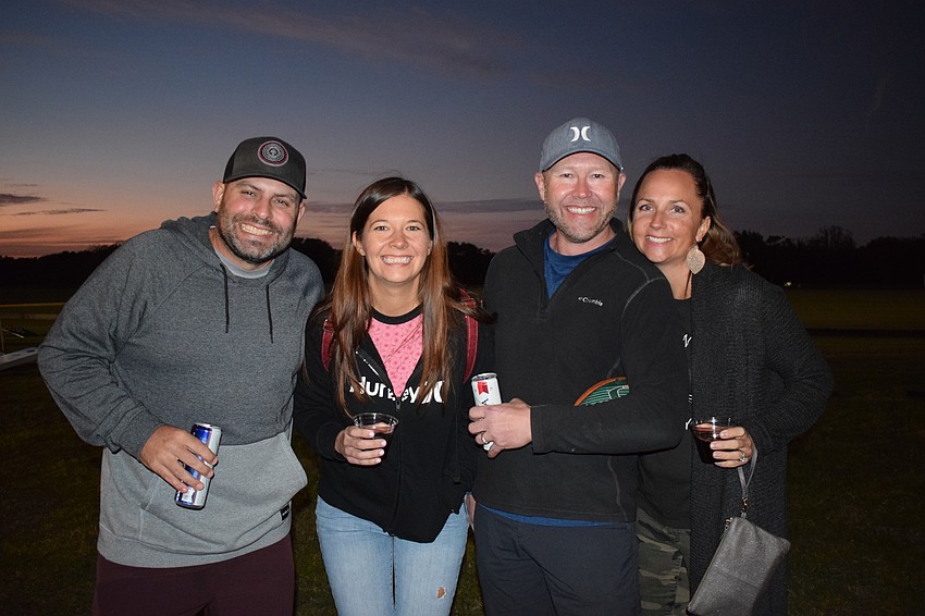 Lakewood Ranch's Josh and Marissa Lee and Jason and Melissa Hueseu love playing cornhole at the Sarasota Polo Club as part of MVP Sports and Social's league because its location is closer than Motorworks Brewing.