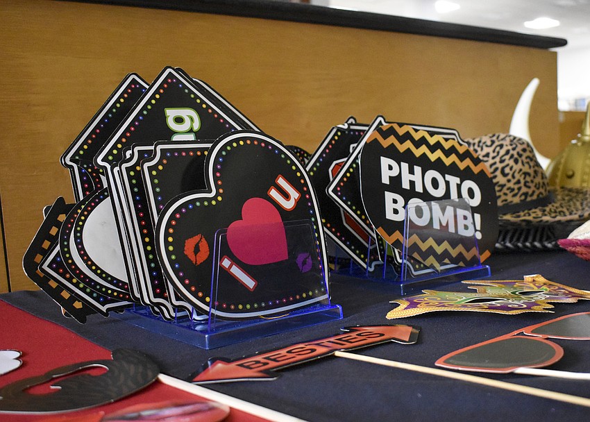Patrons could choose different signs to use in the photo booth.