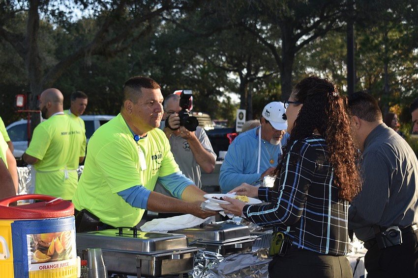Camilo Roldan serves up breakfast with a smile.