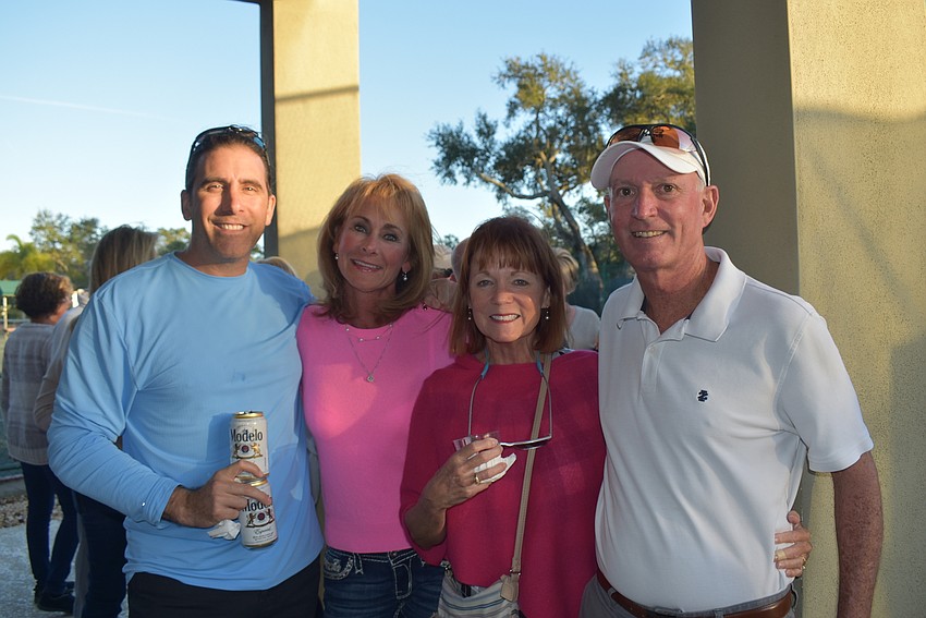 Bryan and Chris Goodwin, Marc Pommainville and Brenda Terihay.