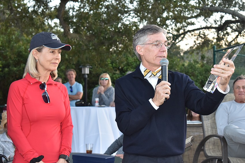 Matt Walsh presents Kay Thayer with her award.
