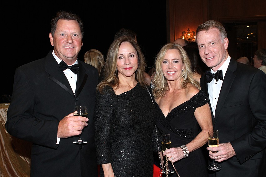 Adrian Gadd and ME Guyton with Minta and Jim Getzen