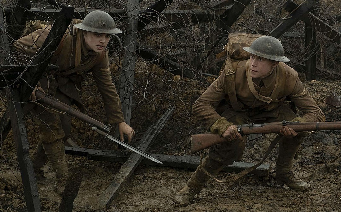 The camera follows as George MacKay, left, and Dean-Charles Chapman move through the trenches on a vital mission in "1917."