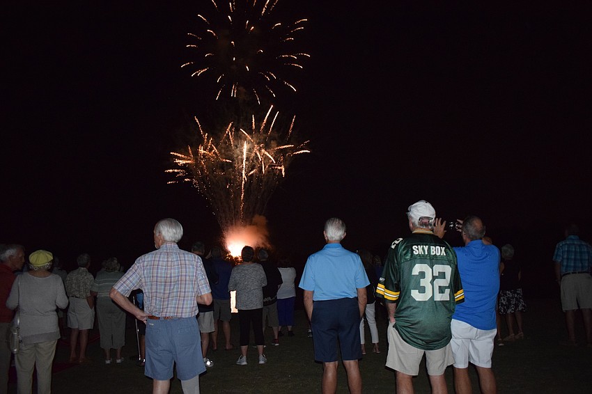 Waterlefe residents watch fireworks commemorating the community's 20th anniversary.