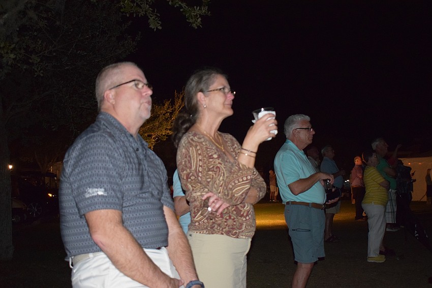 Waterlefe residents Keith and Michelle Wenzel watch fireworks. The Wenzels built their home in 2003 and have been living in the community full time since 2007. 