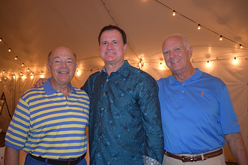 Rob King, a project manager, Doug Egly, a general manager, and Rick Barber, a project manager of Waterlefe Golf and River Club enjoy seeing the community they created thrive.