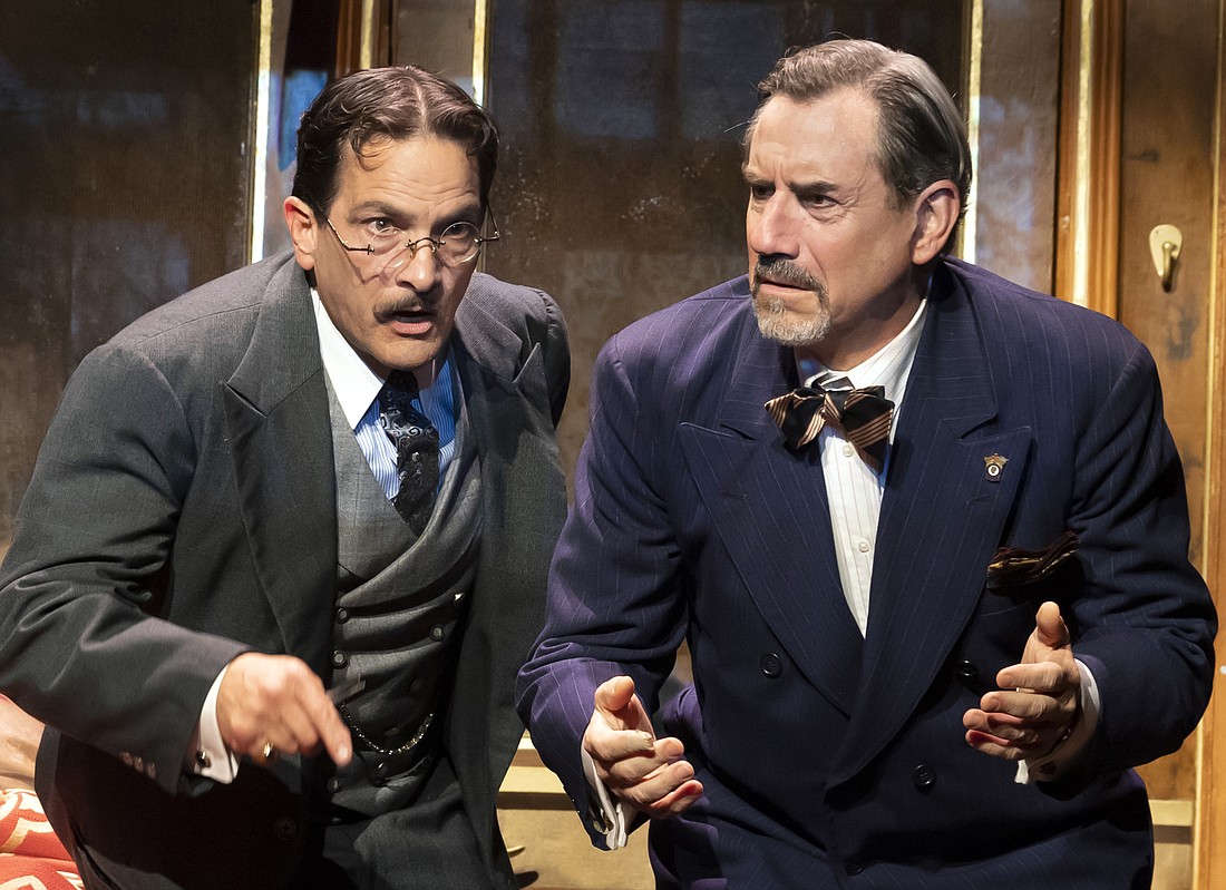 Detective Hercule Poirot (James Devoita, left) finds an unexpected mystery on his hands, and his friend Monsieur Bouc (David Breitbarth) fervently hopes he can solve it in "Murder on the Orient Express." (Photos: Cliff Roles)