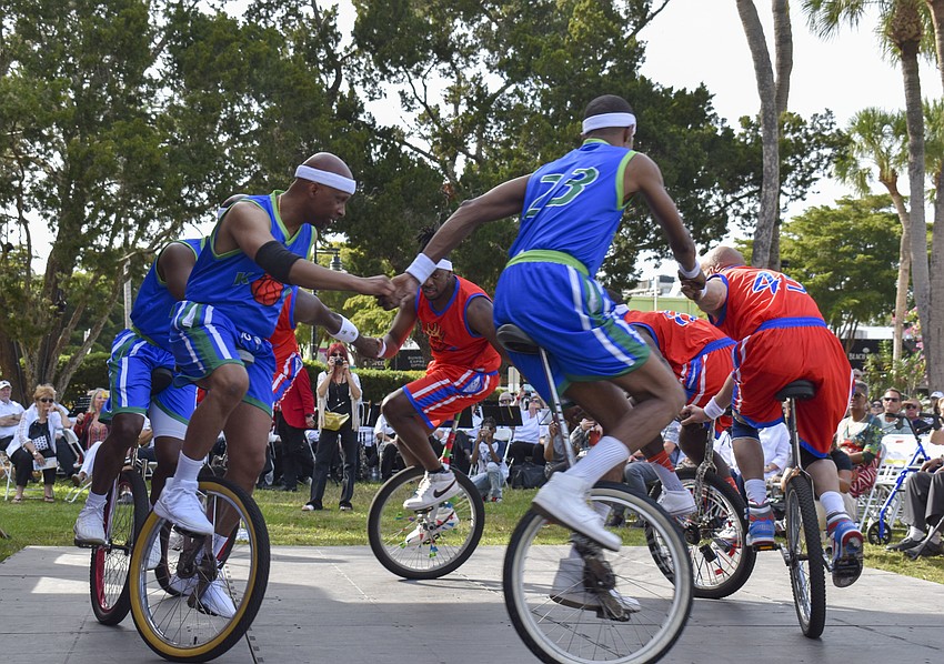 The King Charles Troupe performs before the ceremony begins.