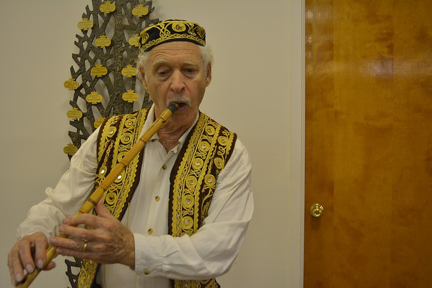 Juan De la Sierra plays his ney, or reed flute, Friday night at Temple Beth Israel. Neys have been used as musical instruments for almost 5,000 years.
