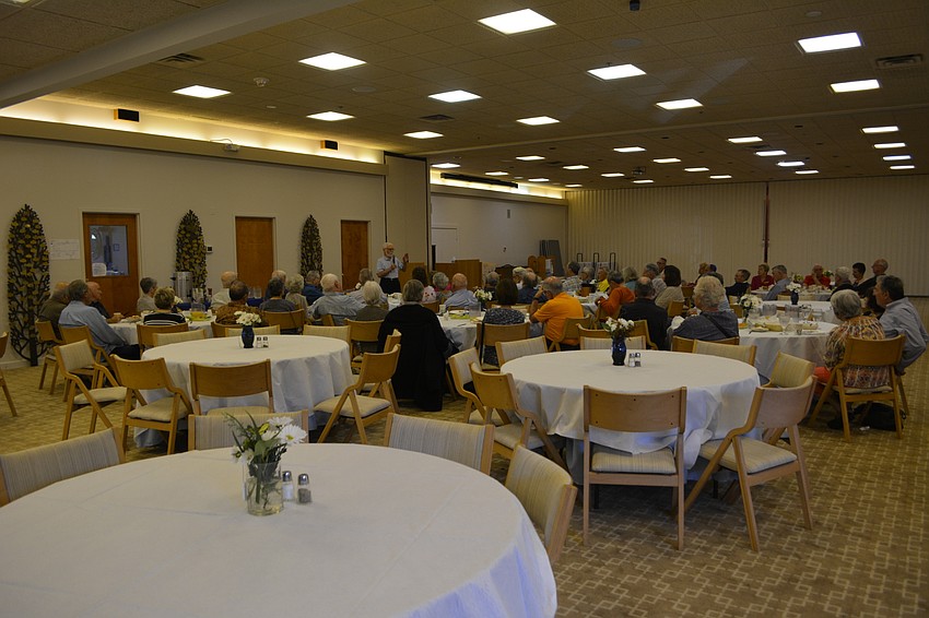 Rabbi Rifat Sonsino (standing) talks about 17th-century Rabbi Sabbatai Zevi's conversion to Islam and the subsequent rise of the Sabbatean movement Sunday morning at Temple Beth Israel.
