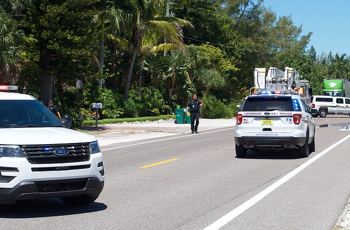 Police and fire units work the scene of a 2019 crash in which a cyclist was killed.