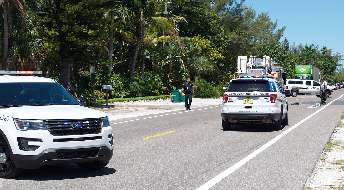 Police and fire units work the scene of a 2019 crash in which a cyclist was killed.