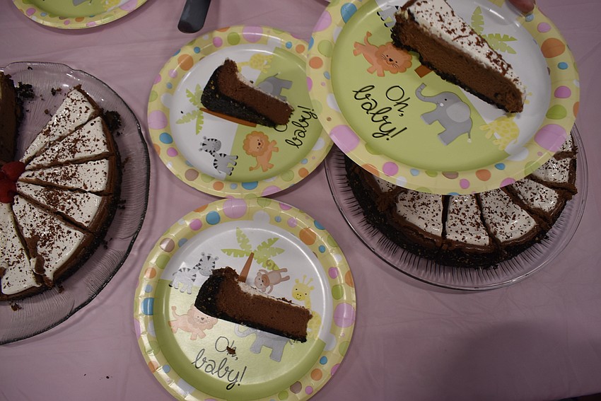 Baby-themed decorations fit the meeting's purpose.