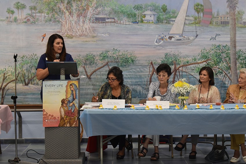 Patty Madsen speaks to the crowd.