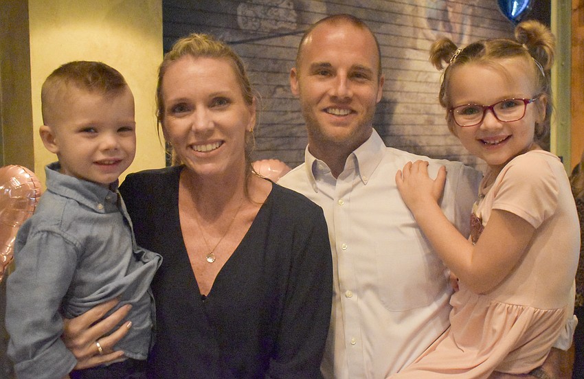 Reid, 3, Kim. Adam and Kinsley Peacock, 6