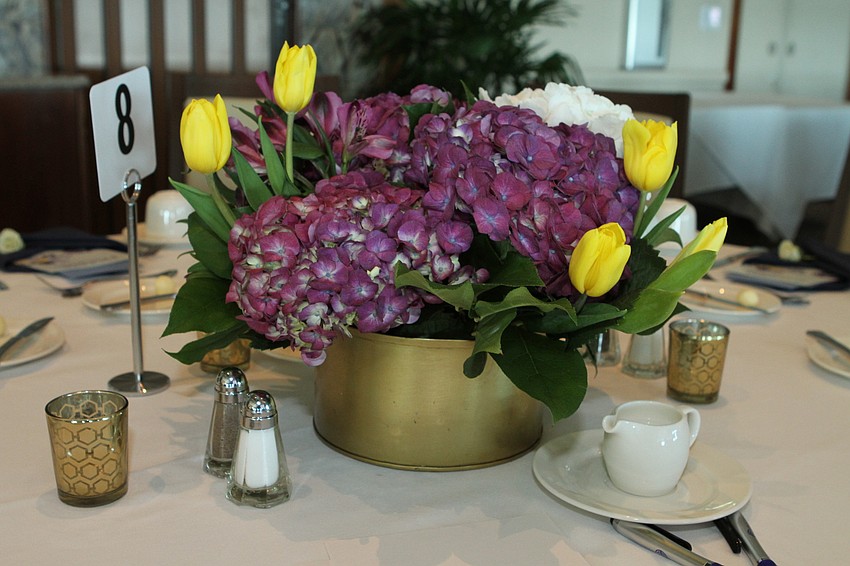 Each table had an uplifting flower arrangement.