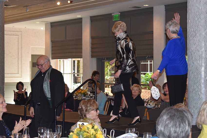 Models make their exit.