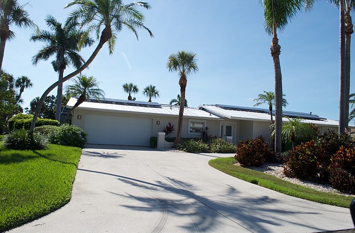 John Long, managing member of Equity Villa Fund LLC, agreed to pay the town $3,640 and court costsÂ to settle a lawsuit that sought to force the property owner of the home on Schooner Lane to cease and desist.