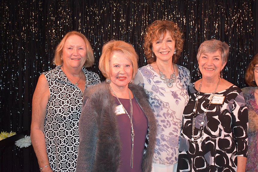Social committee members Sue Pariseau, Gloria Long, singer Marcy Downey and Mary Del Pup.