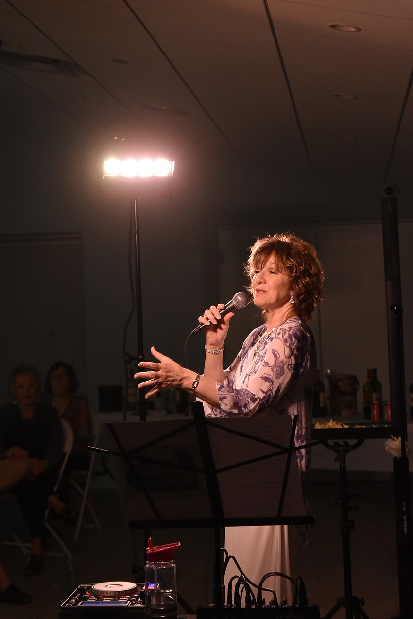 Marcy Downey sang to the crowd.