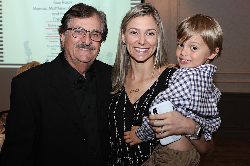 Robert Helman with Jennifer and Blake Nielsen