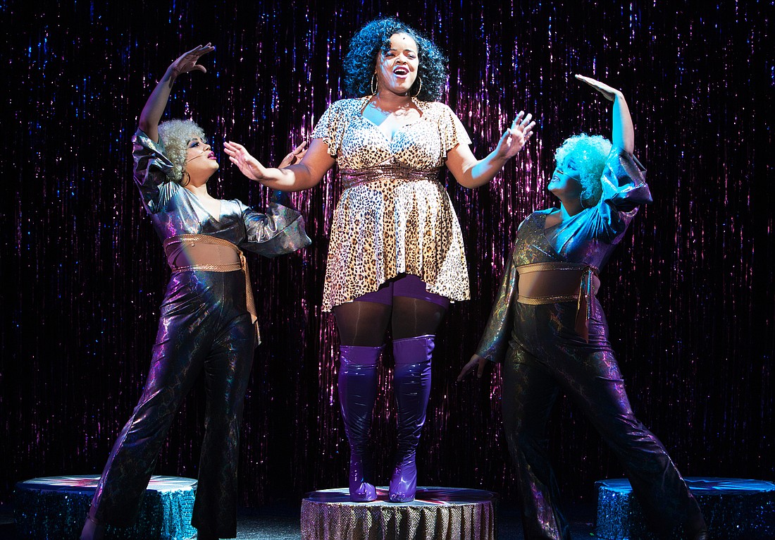 Javisha Strong (with backup dancers Eliette Rogers and Naomi Lockerd) is convincing as a diva in distress in "Sister Act."  Photo: Don Daly