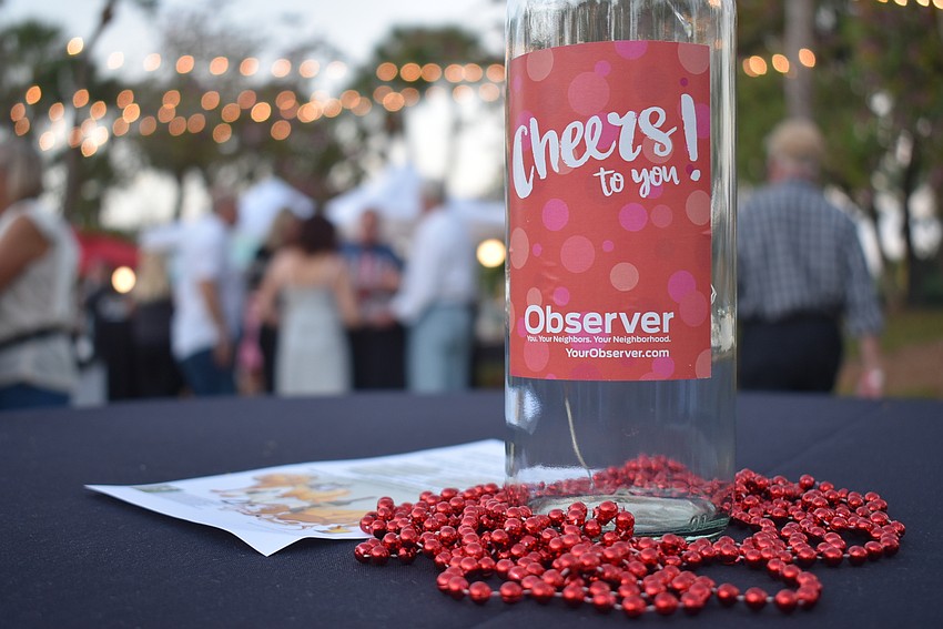 Attendees mingled under twinkling lights.
