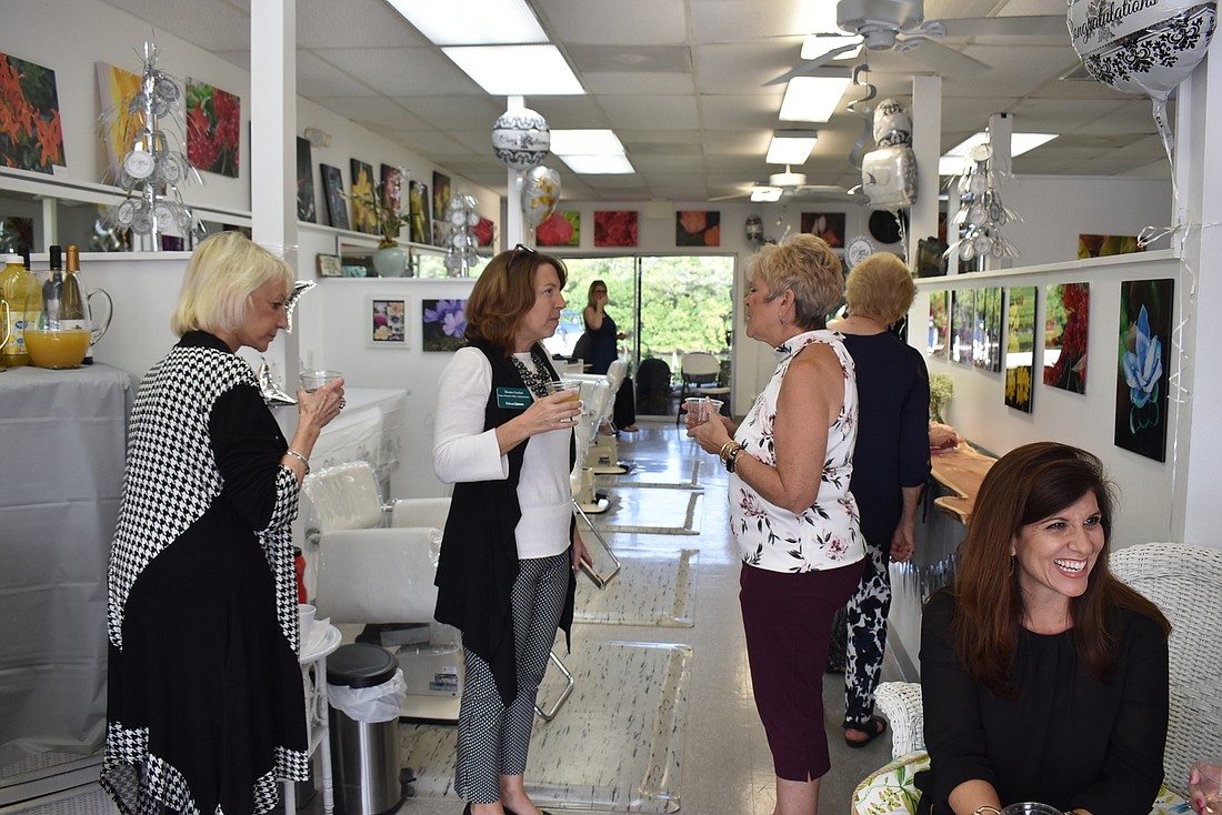 The salon&#39;s open house celebration stayed a party all day long.
