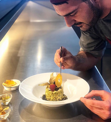 La Norma chef Davide Nanni crafts a dish, as he said he always does, with painstaking precision. (Photo courtesy of Davide Nanni)