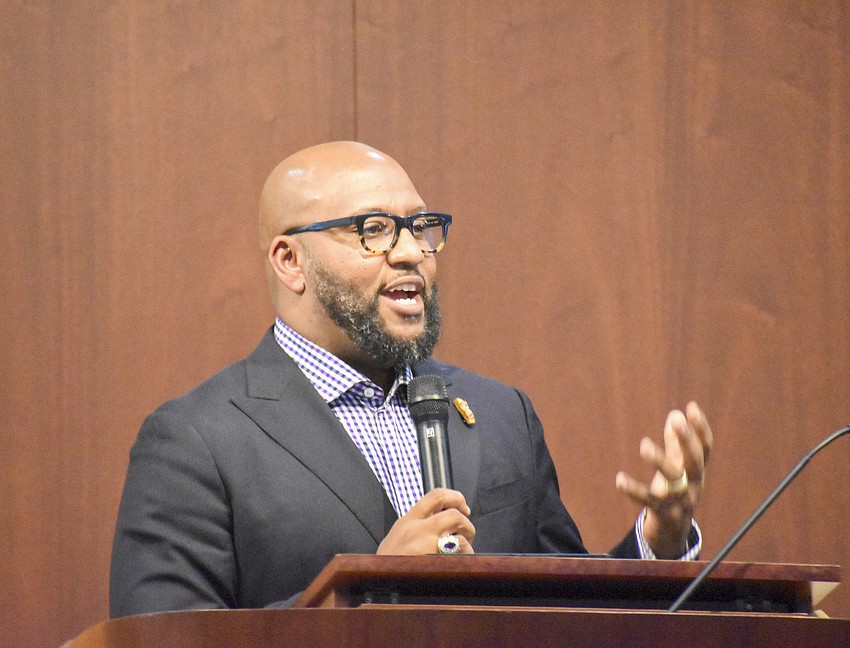 Reverend Kelvin Lumpkin preaches to the joint congregations.
