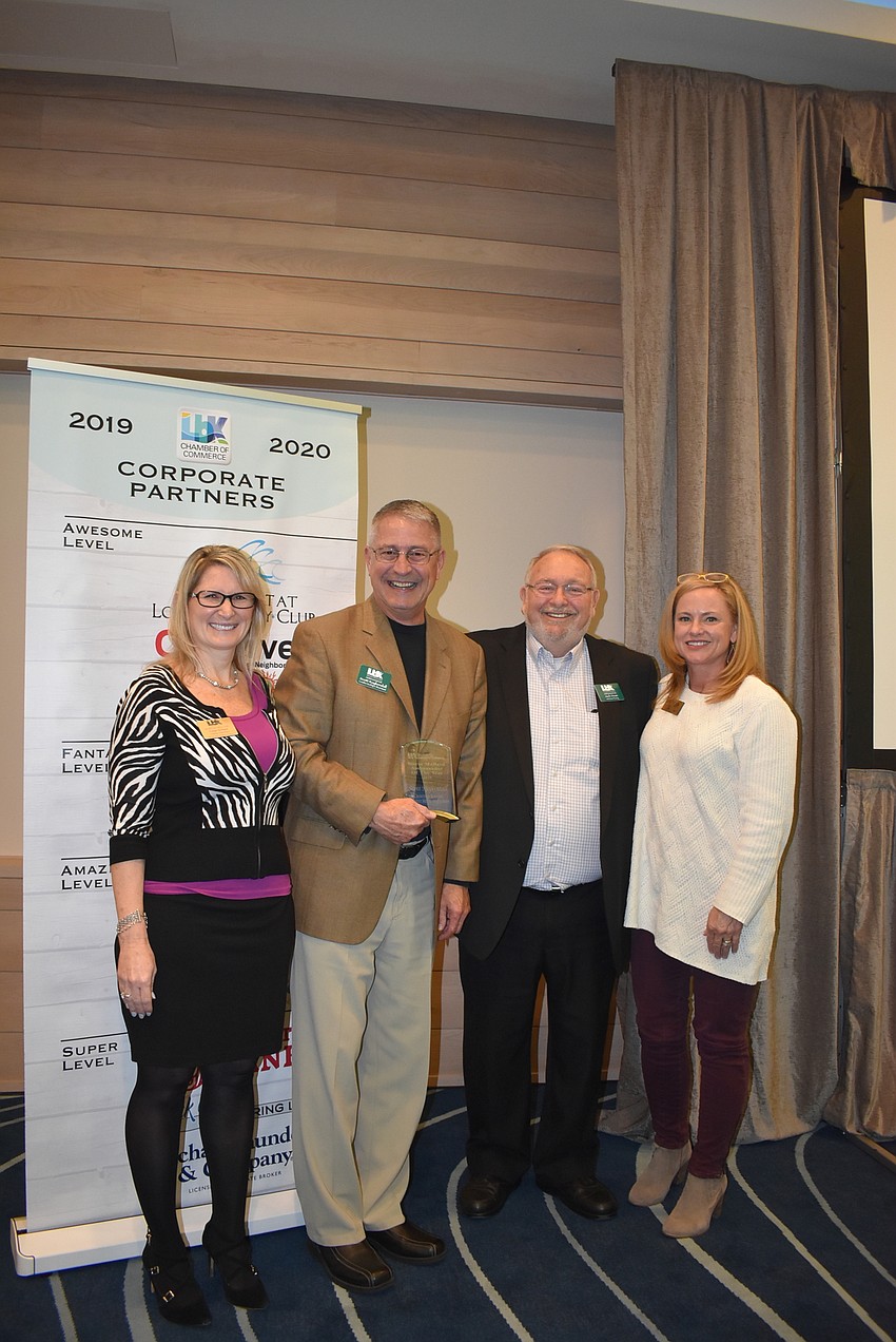 Ambassador of the Year Scott Kuykendall with Tonya Atchison, Jack Dean and Audra Snyder, who presented the award.