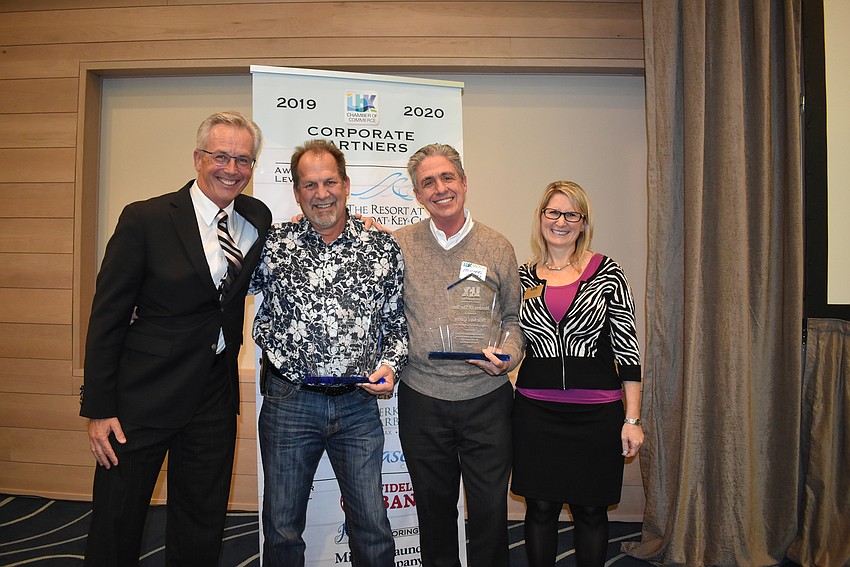 Michael Vejins with Chamber Member of the Year winners Mark Meador and Michael Garey, plus Tonya Atchison.