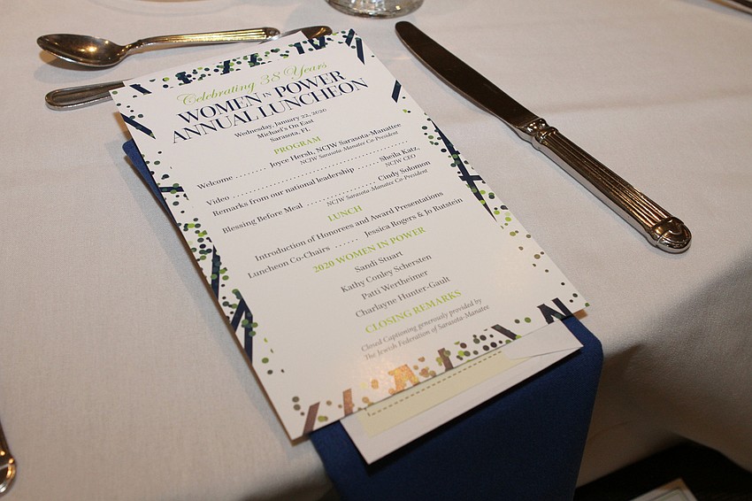 Co-president Cindy Solomon performed the blessing before the program's meal.