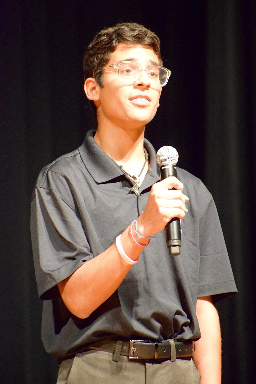 Senior Juan Brito sings his part in 