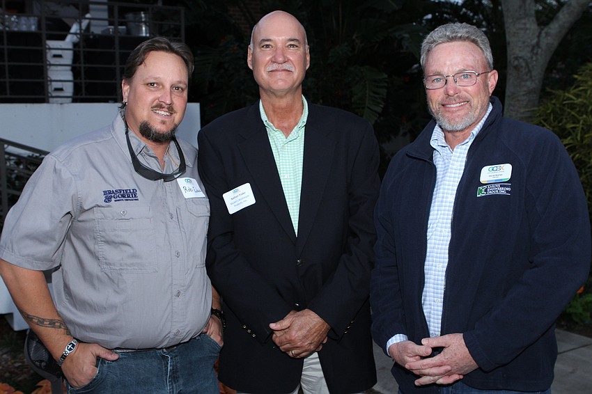 Rob Eckart, Nathan Yoder and chairman David Karins