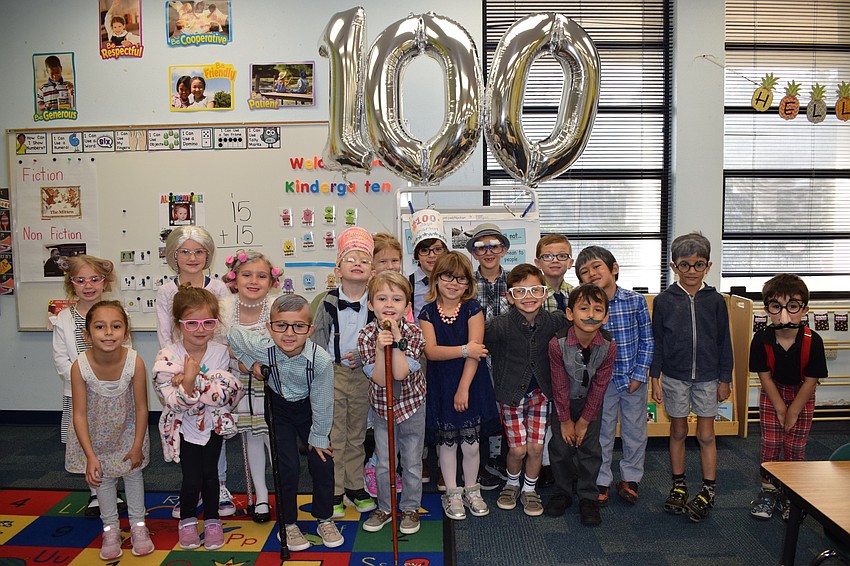 Gene Witt Elementary School kindergartners celebrate the 100th day of school by dressing as 100 year olds.
