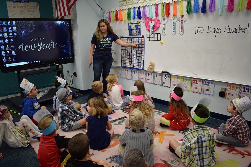 Kindergarten teacher Danielle Stooksbury's class counts to 100 by fives and tens.