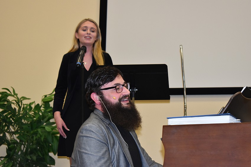 Stella Curry sang her heart out while Silverman played pianos.