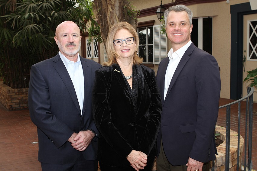 Board chair John Peshkin, President and CEO Renee Snyder and keynote speaker Dr. Robert McClure