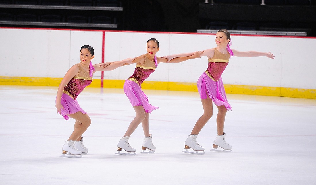 Gabriella Thomas (middle) competed with her Ellenton Epic Edge teammates Meyana Burtram and Heidi Raley at the 2020 Eastern Synchronized Skating Sectional Championships. Photo courtesy Shannon Raley.