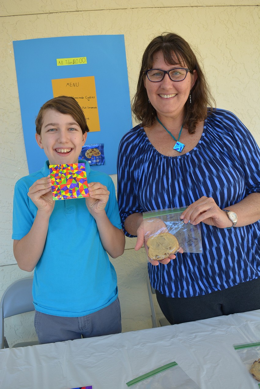 Palm Aire's Gabe Williams, 11, sold tiles, necklaces and chocolate chip cookies with the help of his mom, Katrina Williams.