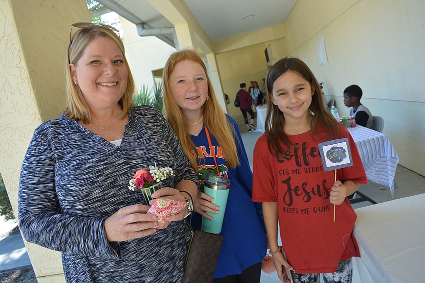 Braden River Lakes' Jessica Eastman and her daughter Abby Pollard visited booths with friend Lexi Delagrange.